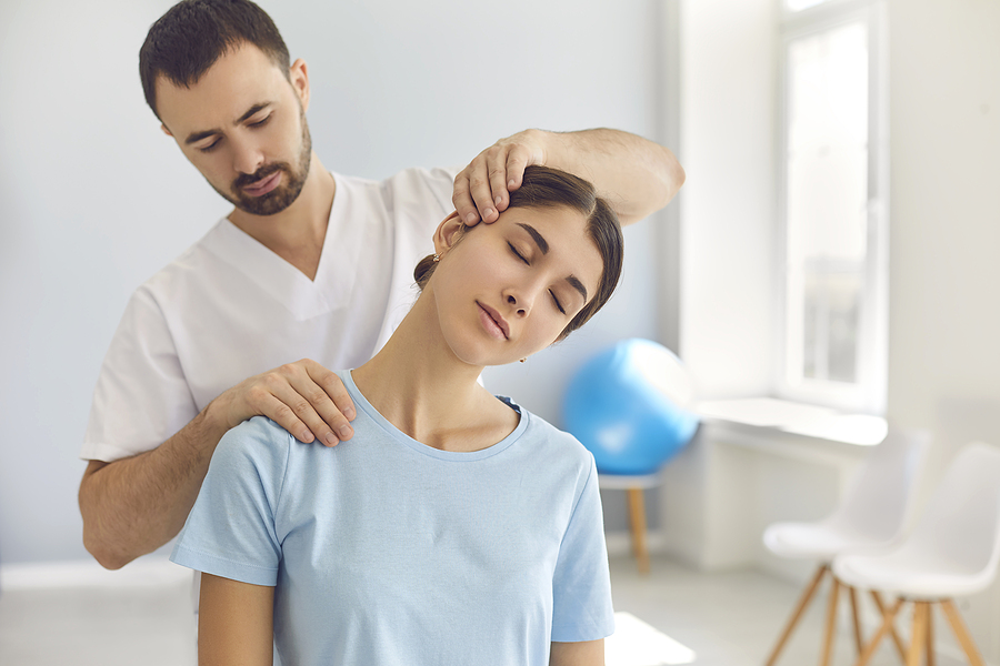 Woman getting an appropriate neck pain treatment